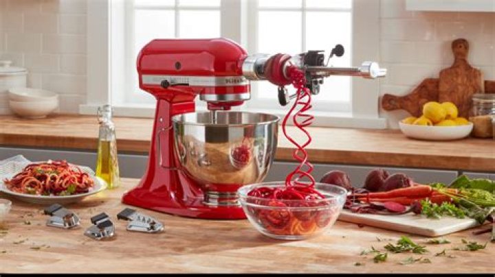 How do I service my KitchenAid Artisan mixer?